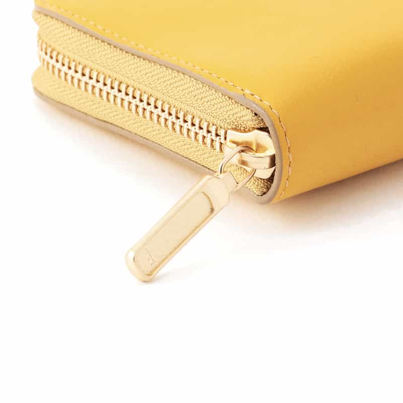 BARNEYS NEW YORK ラウンドジップ ロングウォレット YELLOW