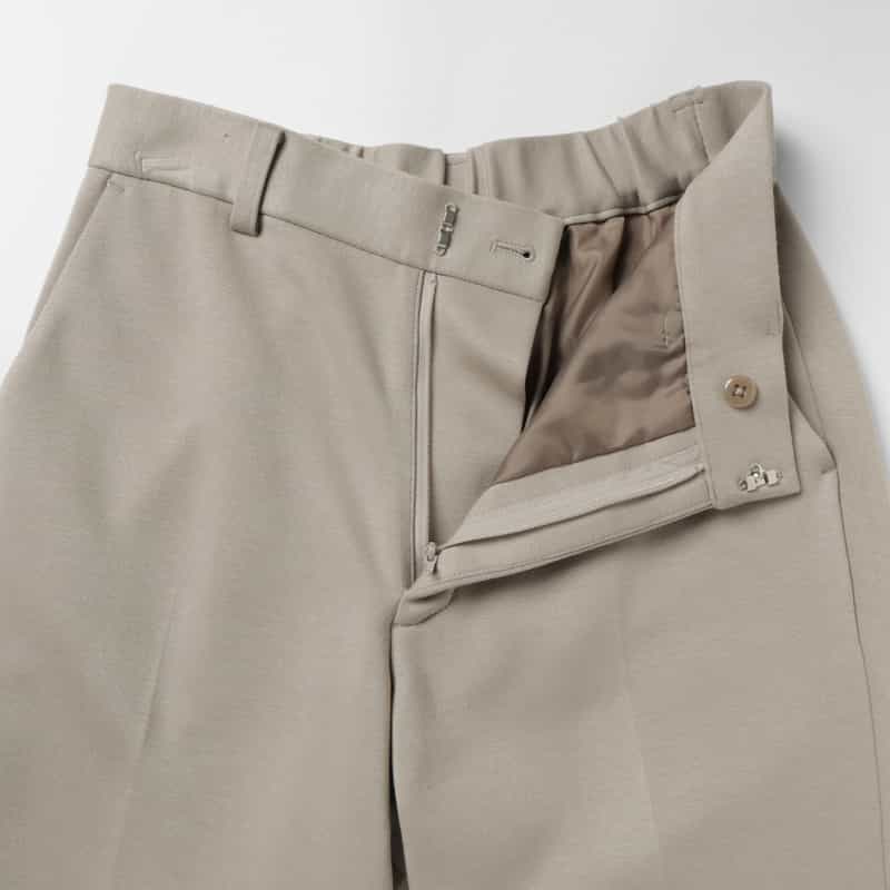 BARNEYS NEW YORK デュアルウォーム素材テーパードパンツ GRAY BEIGE