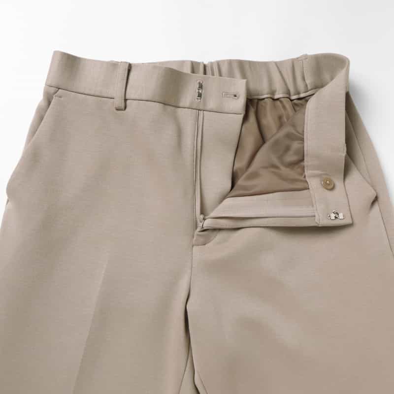 BARNEYS NEW YORK デュアルウォーム素材テーパードパンツ GRAY BEIGE