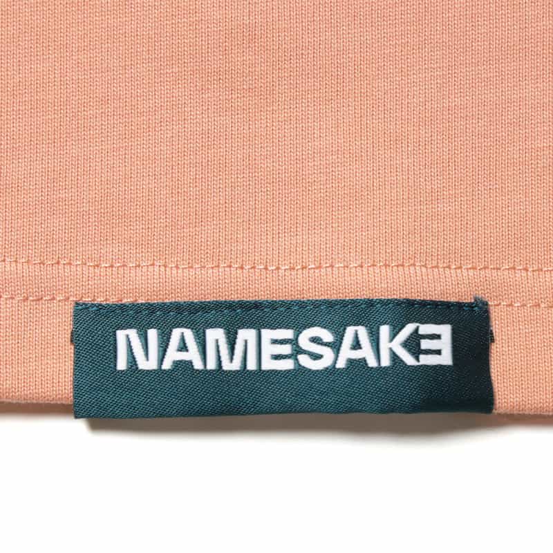 NAMESAKE NAMESAKE＜ネームセイク＞プリントTシャツ PINK
