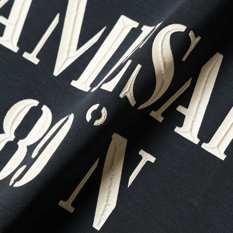 NAMESAKE NAMESAKE＜ネームセイク＞プリントTシャツ NAVY