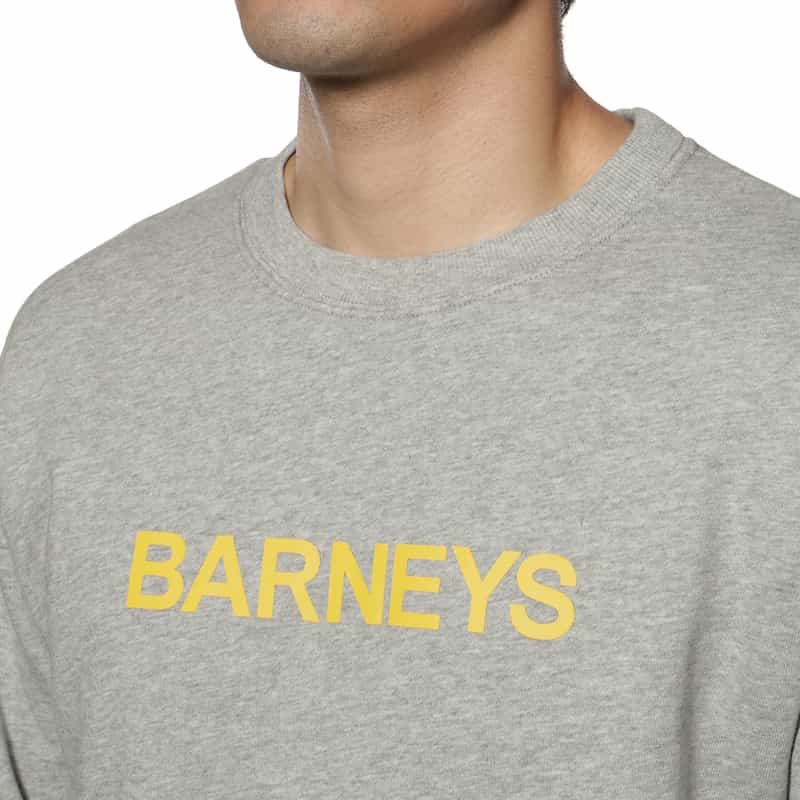 BARNEYS NEW YORK "BARNEYS" ロゴ入りスウェットプルオーバー YELLOW
