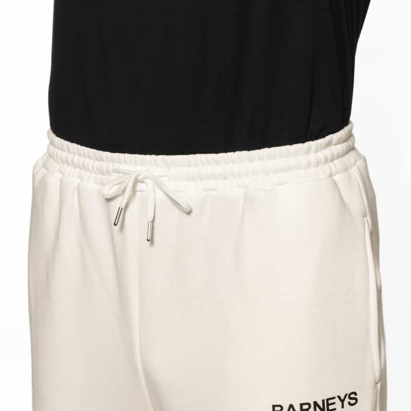 BARNEYS NEW YORK "BARNEYS" ロゴ入りスウェットパンツ WHITE