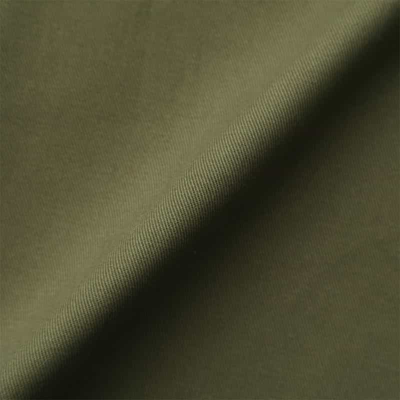 BARNEYS NEW YORK ウォッシャブル フロントジップ アシンメトリーヘムスカート KHAKI