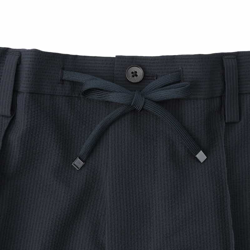 BARNEYS NEW YORK サッカー素材ストレッチパンツ NAVY