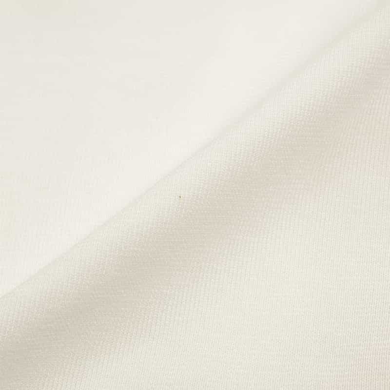 BARNEYS NEW YORK ウォッシャブル フリルヘム パールボタン付きニットカーディガン WHITE