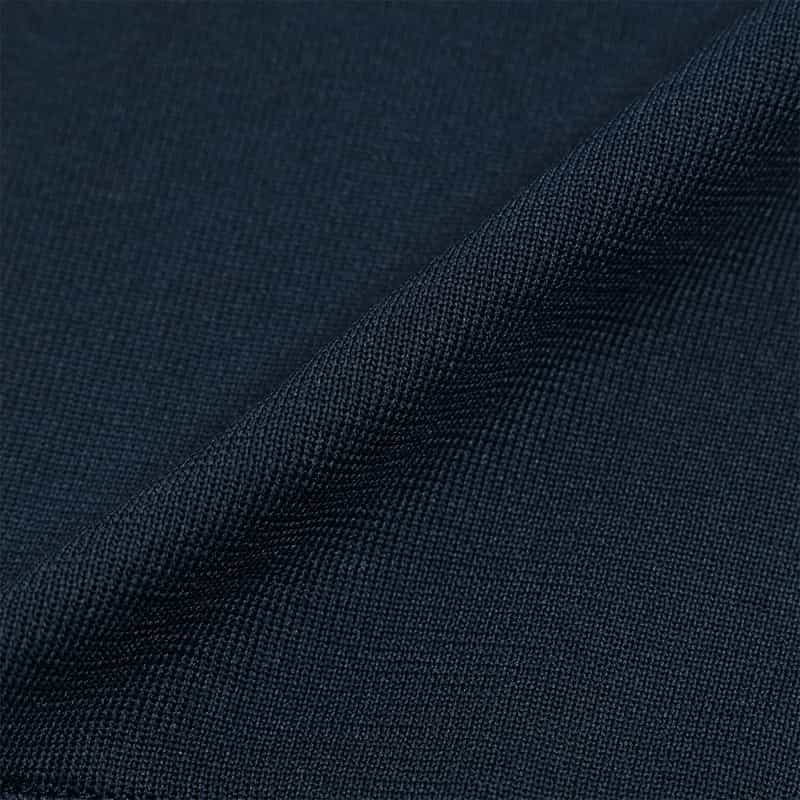 BARNEYS NEW YORK ウォッシャブル フリルヘム パールボタン付きニットカーディガン NAVY