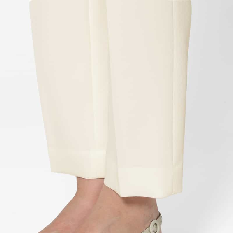 BARNEYS NEW YORK セットアップ ウォッシャブル フリルポケットデザイン スリムテーパードパンツ OFF WHITE