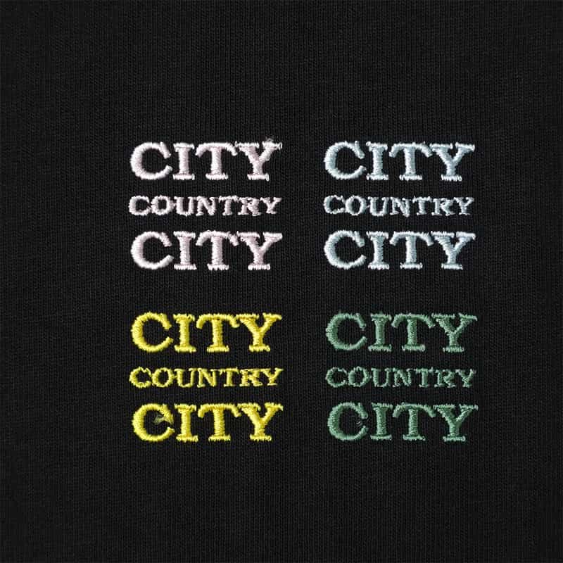 CITY COUNTRY CITY CITY COUNTRY CITY ＜シティーカントリーシティー＞ ロゴ入りTシャツ BLACK