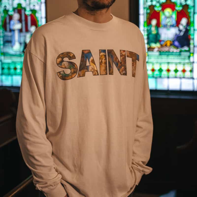 SAINT MXXXXXX SAINT MXXXXXX＜セント マイケル＞ プリントロゴ入りロングスリーブTシャツ WHITE