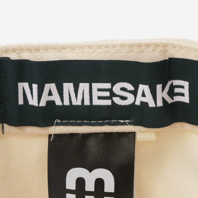 NAMESAKE NAMESAKE＜ネームセイク＞ ベースボールキャップ BEIGE