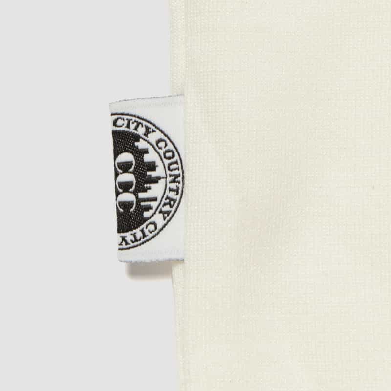 CITY COUNTRY CITY CITY COUNTRY CITY＜シティーカントリーシティー＞ ロゴ入りTシャツ WHITE