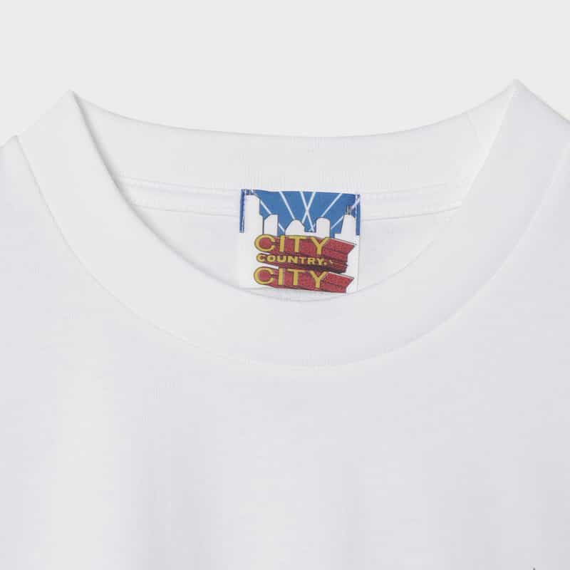 CITY COUNTRY CITY CITY COUNTRY CITY ＜シティーカントリーシティー＞ グラフィックTシャツ WHITE
