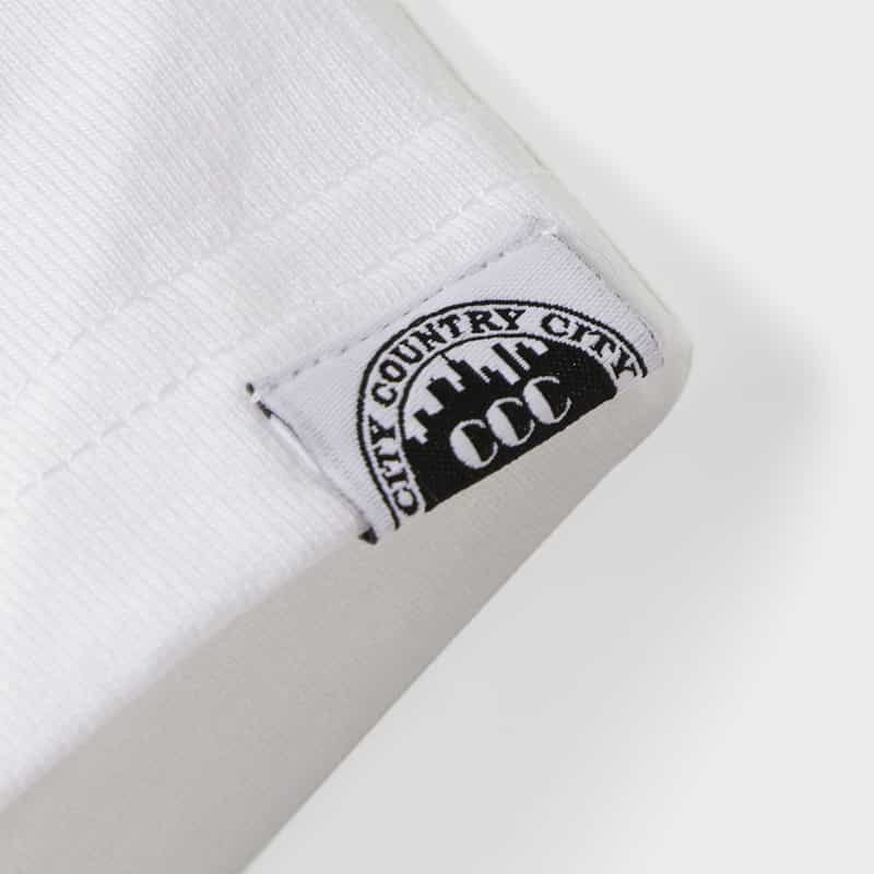 CITY COUNTRY CITY CITY COUNTRY CITY ＜シティーカントリーシティー＞ グラフィックTシャツ WHITE