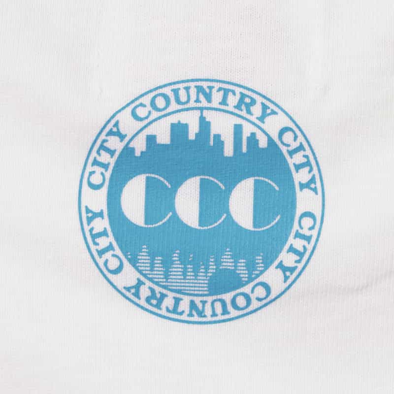 CITY COUNTRY CITY CITY COUNTRY CITY ＜シティーカントリーシティー＞ グラフィックTシャツ WHITE