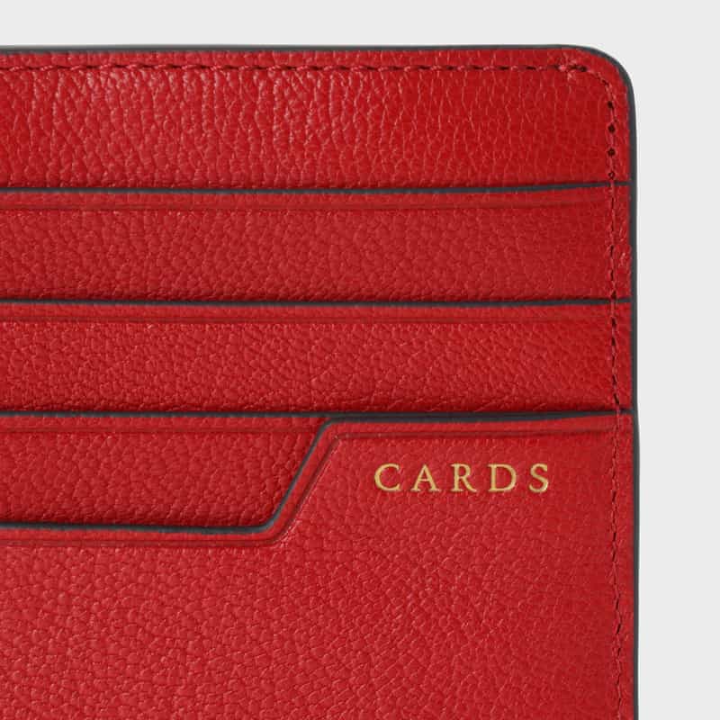 ANYA HINDMARCH ANYA HINDMARCH＜アニヤ ハインドマーチ＞ フラグメントケース “milky“ RED