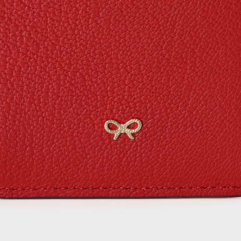 ANYA HINDMARCH ANYA HINDMARCH＜アニヤ ハインドマーチ＞ フラグメントケース “milky“ RED