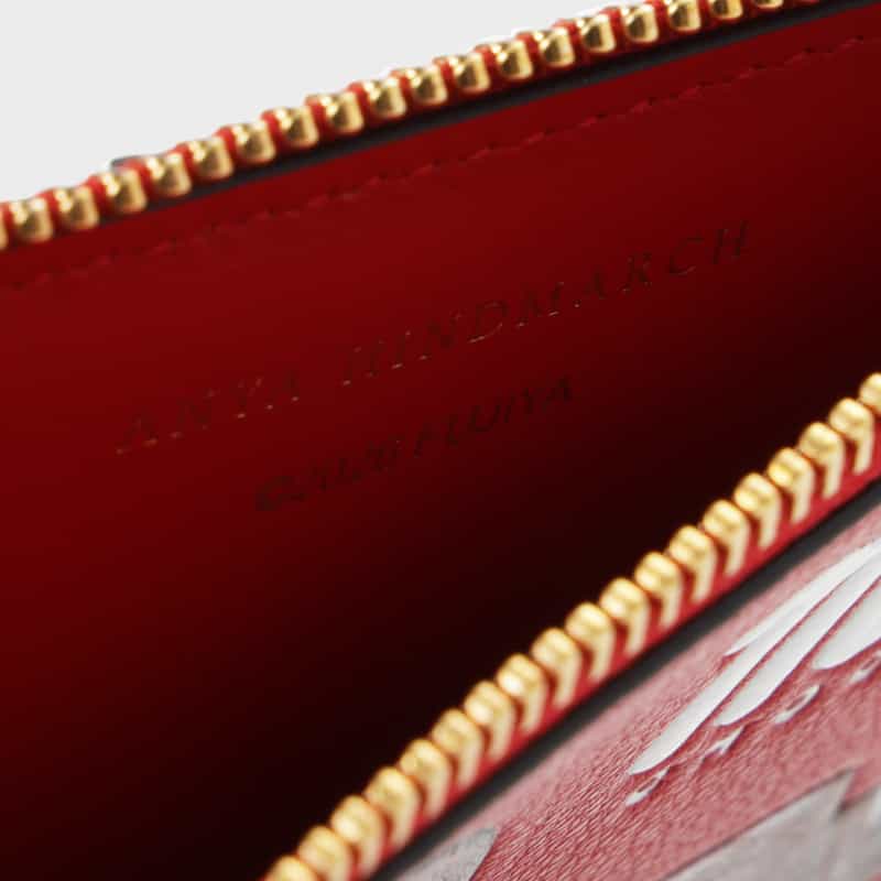 ANYA HINDMARCH ANYA HINDMARCH＜アニヤ ハインドマーチ＞ フラグメントケース “milky“ RED