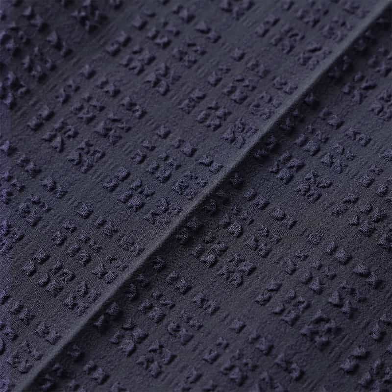 BARNEYS NEW YORK セットアップ ブロックサッカー素材ストレッチパンツ NAVY