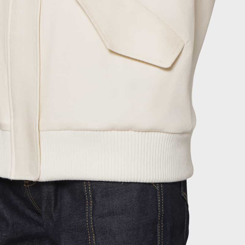 BARNEYS NEW YORK ドロップショルダー フリルデザイン ジップアップブルゾン WHITE