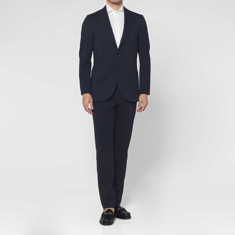 BARNEYS NEW YORK セットアップ サッカーストライプ素材ストレッチパンツ NAVY