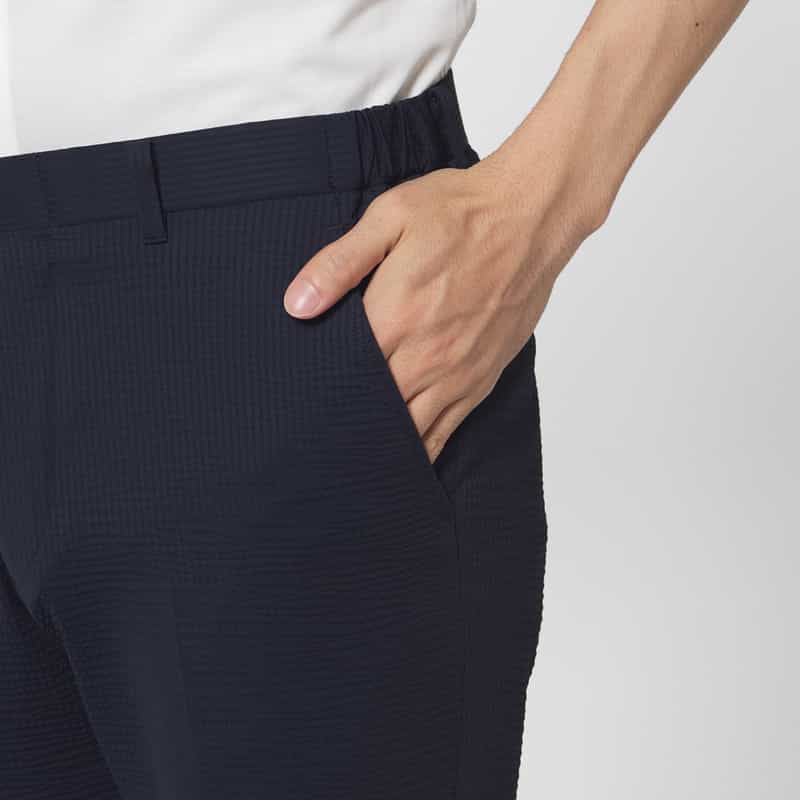 BARNEYS NEW YORK セットアップ サッカーストライプ素材ストレッチパンツ NAVY