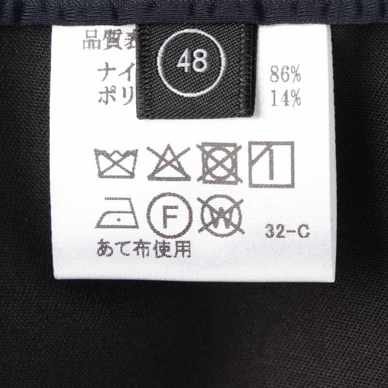 BARNEYS NEW YORK セットアップ サッカーストライプ素材ストレッチパンツ NAVY