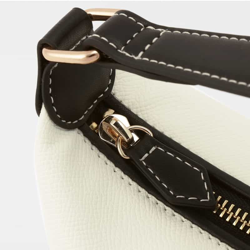 BARNEYS NEW YORK パンチングロゴ ワンハンドルミニバッグ WHITE