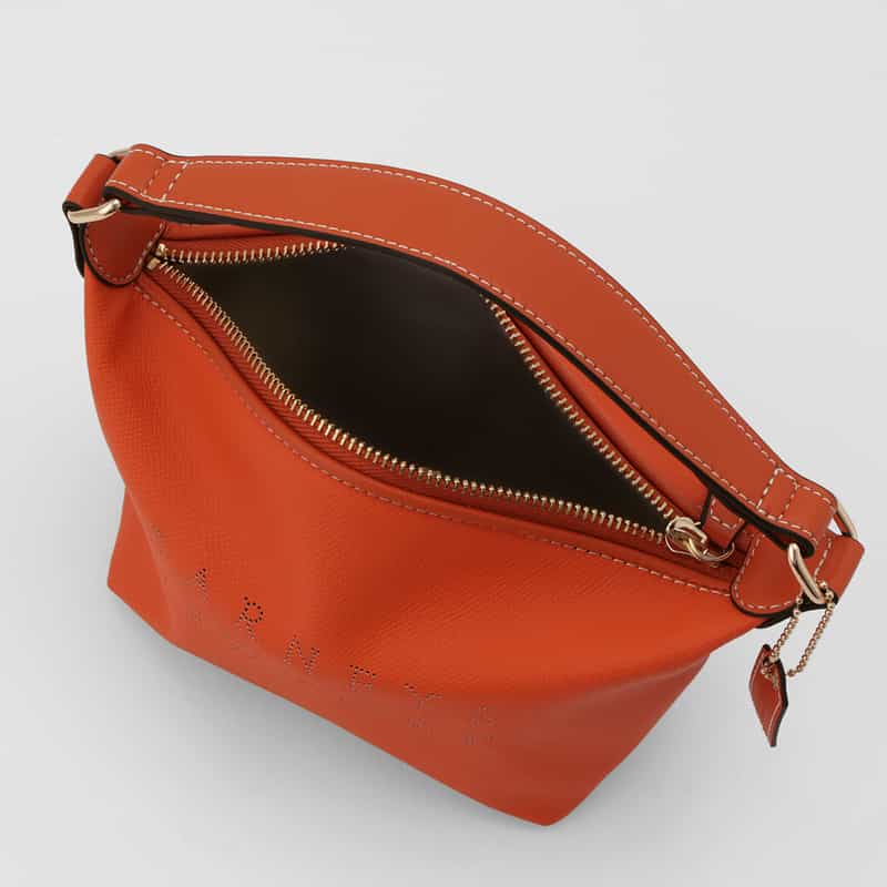 BARNEYS NEW YORK パンチングロゴ ワンハンドルミニバッグ ORANGE