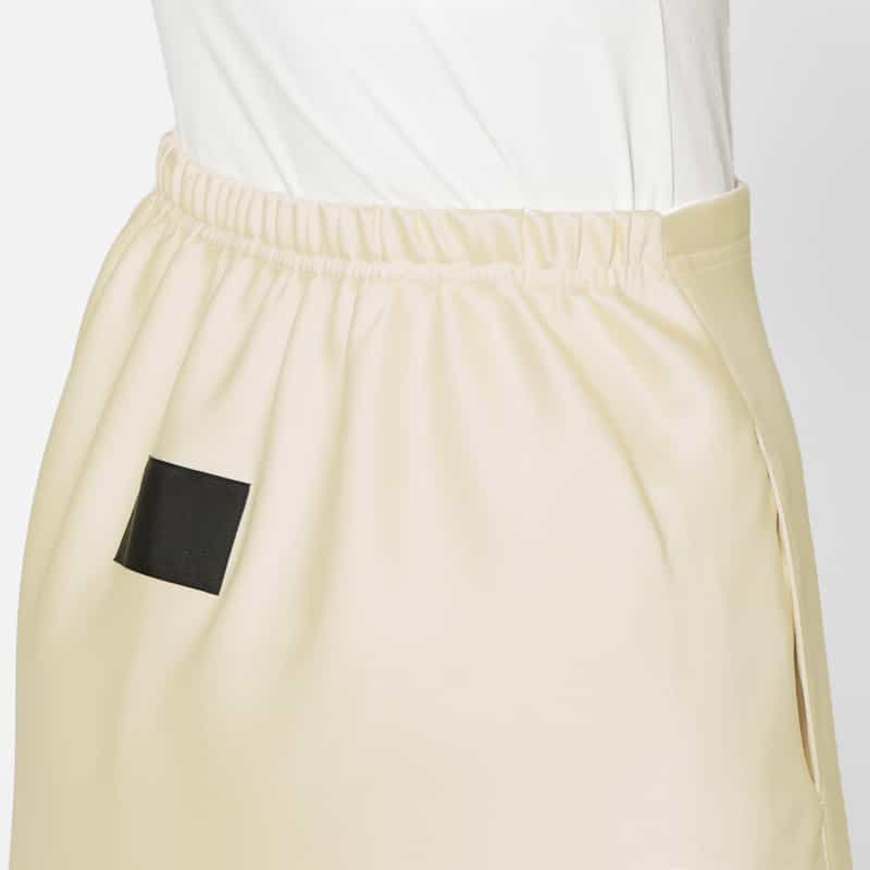 COGTHEBIGSMOKE COGTHEBIGSMOKE ＜コグザビッグスモーク＞ シャイニー素材ドローストリング ロングスカート IVORY