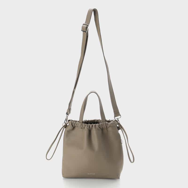 BARNEYS NEW YORK ソフトレザー ドローストリングバッグ GRAY BEIGE