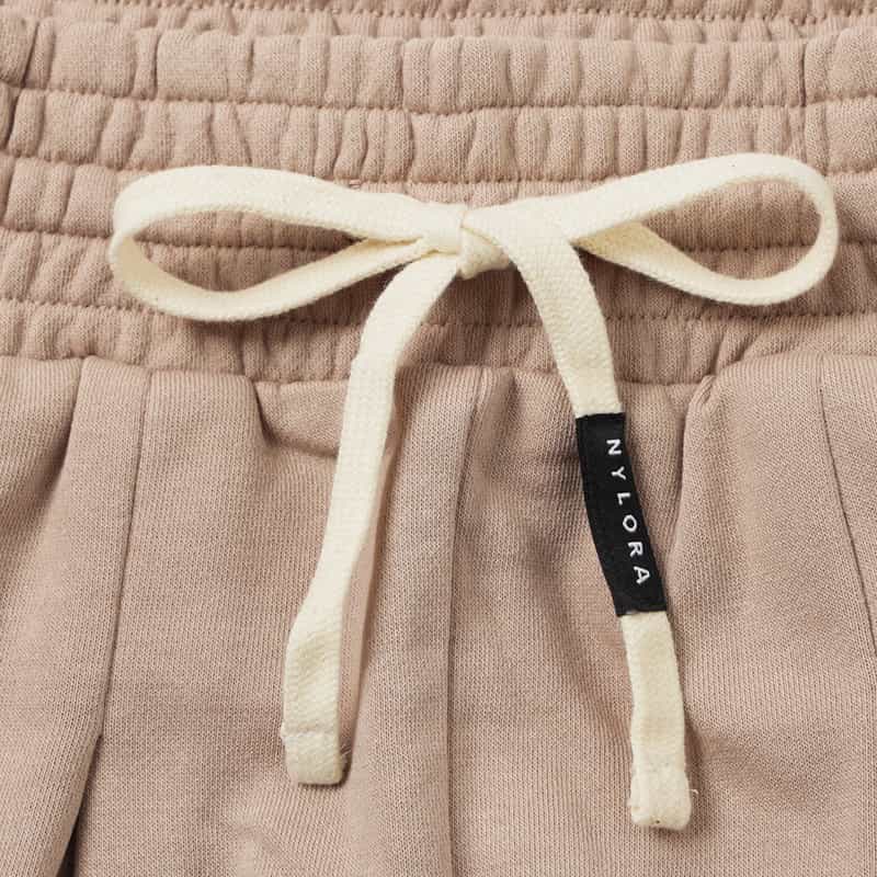 NYLORA NYLORA＜ナイロラ＞ スウェットパンツ BEIGE