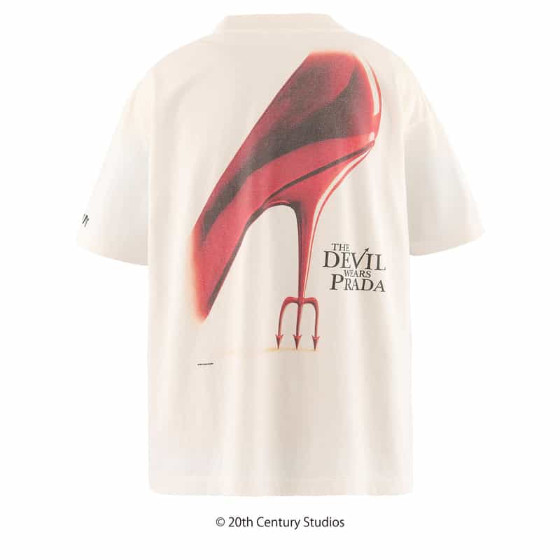 SAINT MXXXXXX SAINT MXXXXXX＜セント マイケル＞ ヴィンテージ加工グラフィックTシャツ “プラダを着た悪魔" WHITE