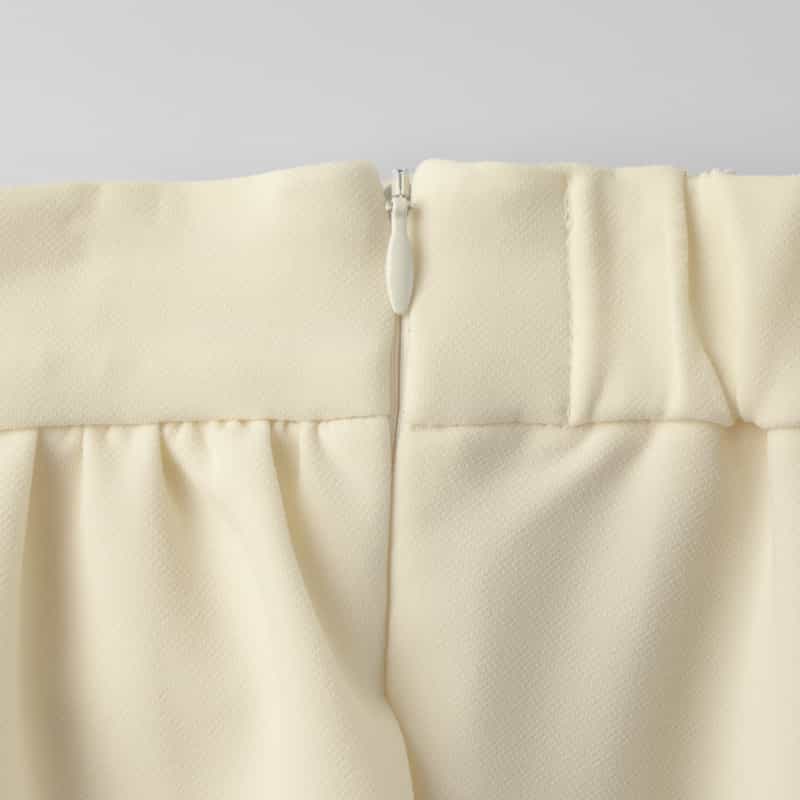 BARNEYS NEW YORK セットアップ ジャージーライクテーパードパンツ OFF WHITE