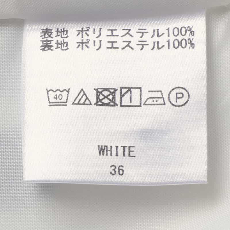 BARNEYS NEW YORK セットアップ ウォッシャブル リネンライク ドット柄ペプラムヘムブラウス WHITE