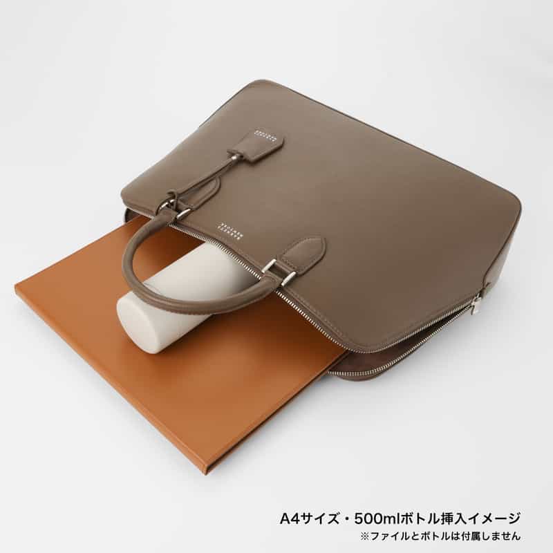 BARNEYS NEW YORK ラウンドレザーブリーフケース BEIGE